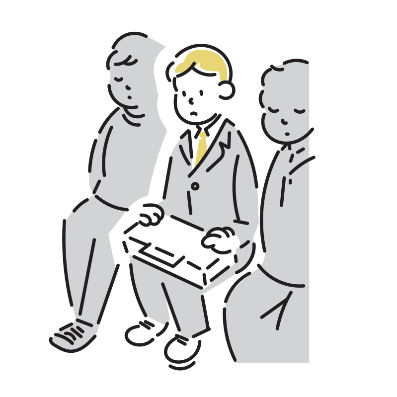 社会人が鞄を抱えて座っている様子